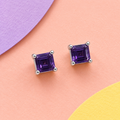 K1028: one pair of 4 mm square baguette cut amethyst ear studs in four claws 925 sterling silver settings.