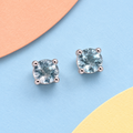 K1029: one pair of 4 mm round aquamarine ear studs in four claws 925 sterling silver settings.