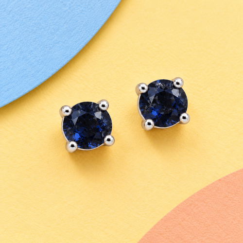K1034: one pair of 4 mm round blue sapphire ear studs in four claws 925 sterling silver settings.